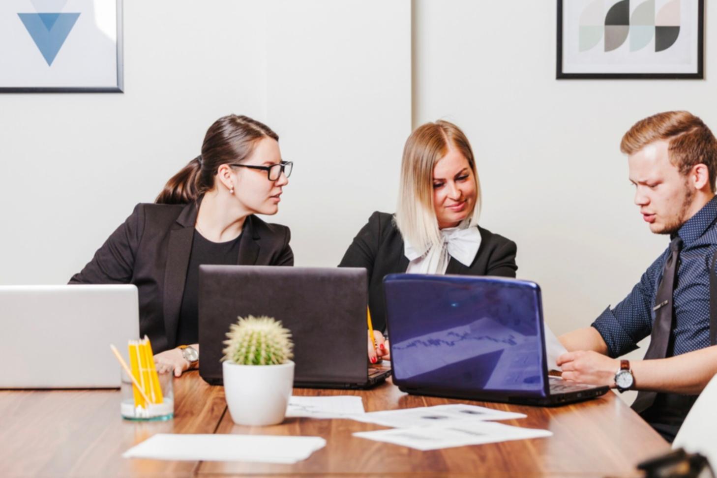 Business owner reviewing financial documents with confidence